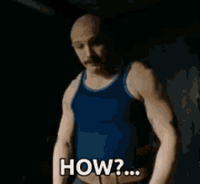 A GIF of a man mouthing the word 'How?' inquiringly, expressing confusion or a request for clarification