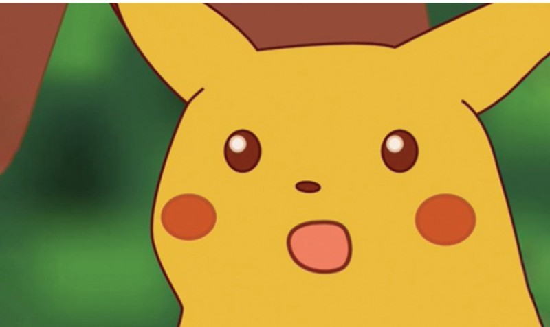 A close-up of the Pokémon Pikachu with a shocked expression and his mouth open, famously known as the 'Surprised Pikachu' meme
